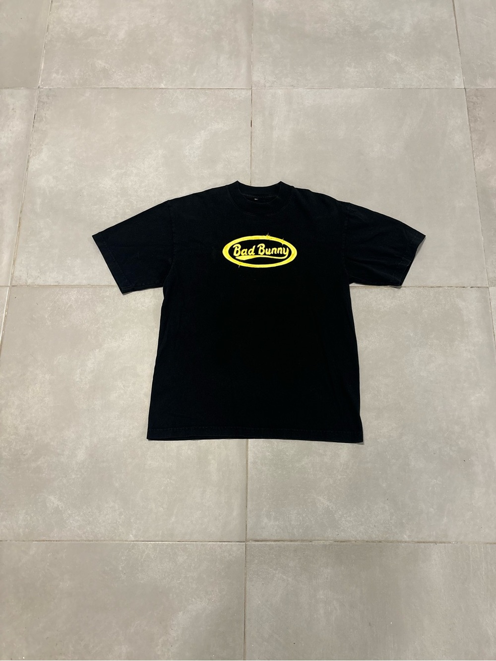 Bad Bunny Men's Black Short Sleeve Tee with Yellow Oval Logo